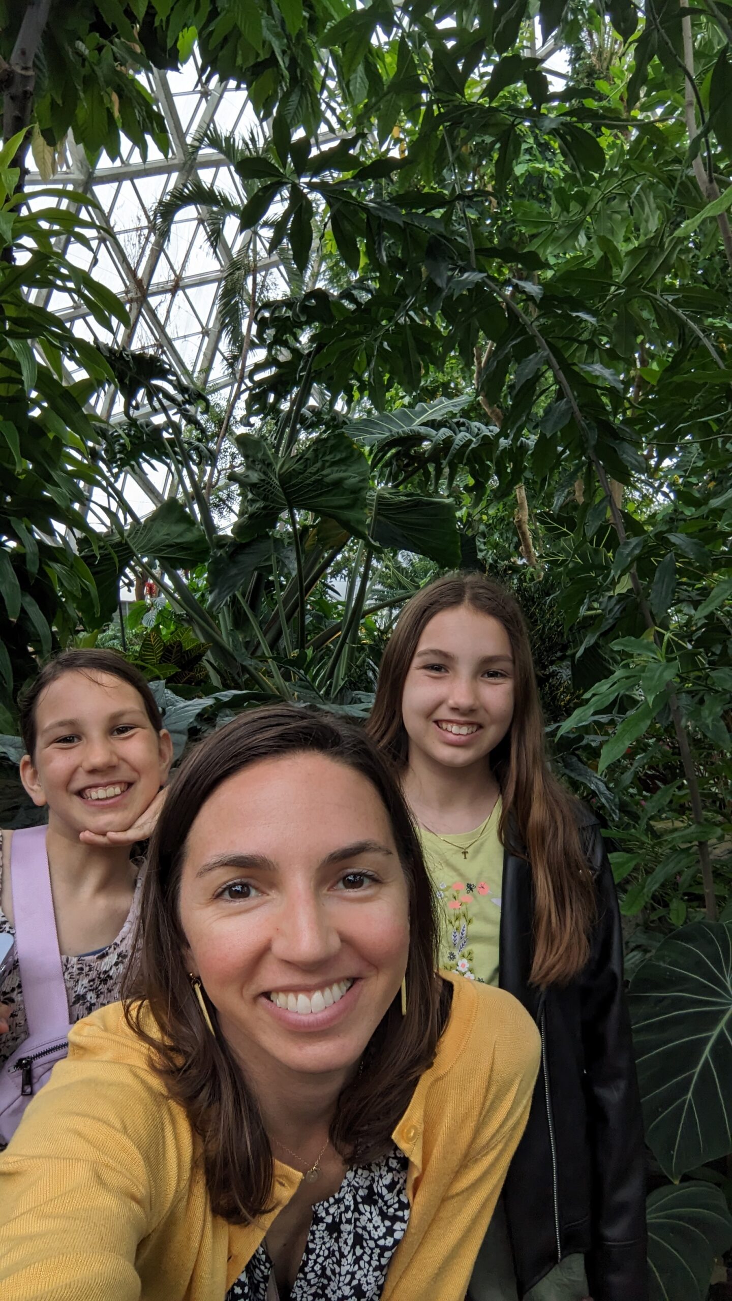 Erin and two daughters at Mitchell Park Domes in April 2024